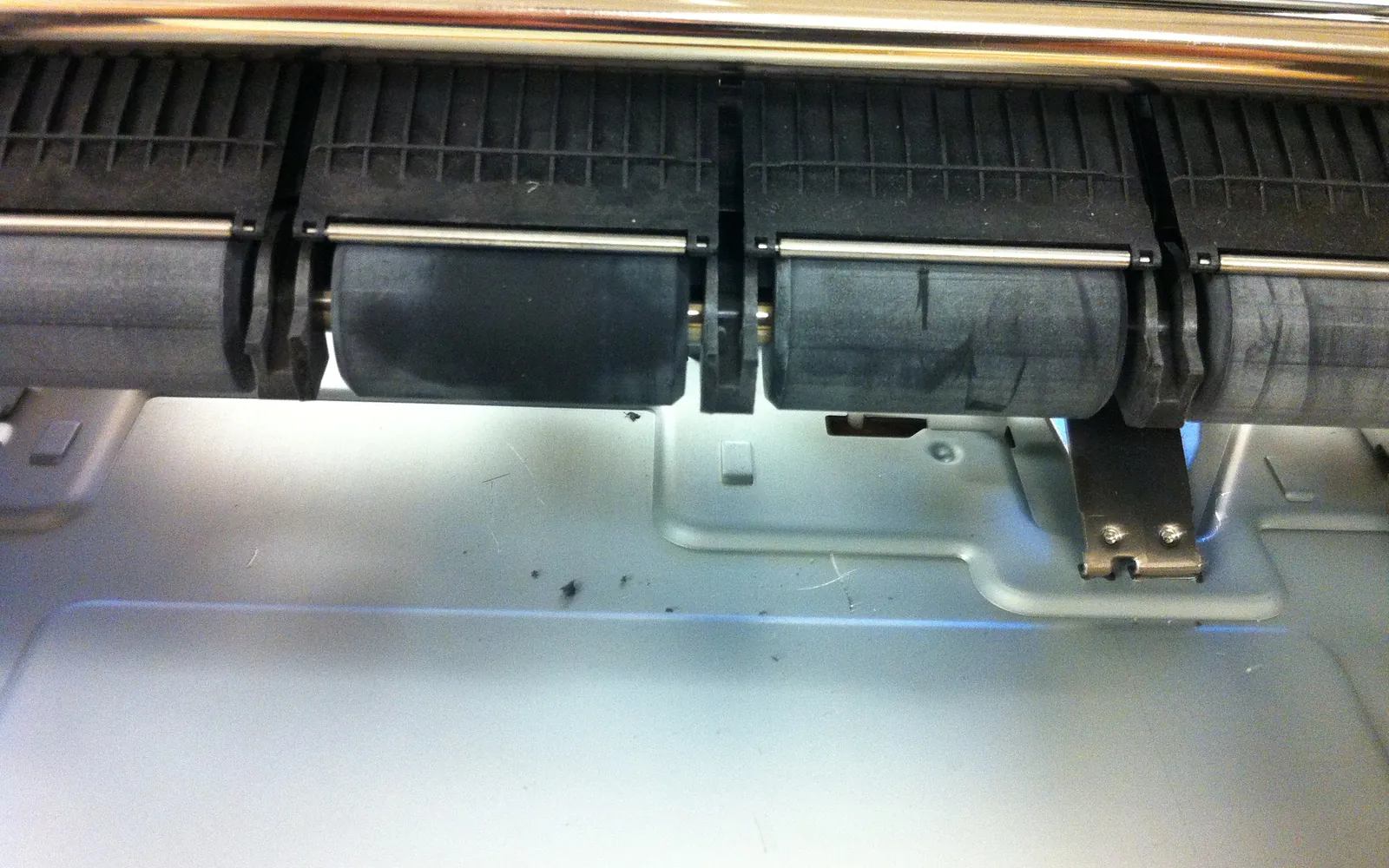 The paper feed rollers inside an inkjet printer